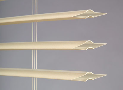Insulating blinds with compressed slats